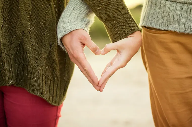 Two hands making a heart shape